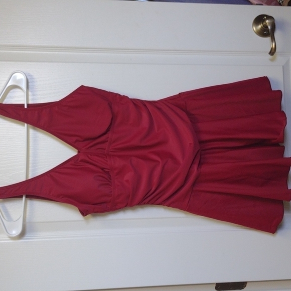 𝅺zealot power red swimsuit with a skirt on it. Size medium. Like new - Picture 1 of 5